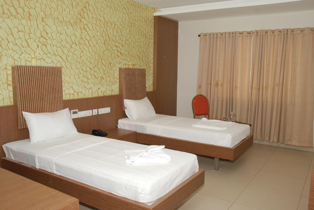 Hotel Pla Amrith Inn Tiruchirappalli Номер фото